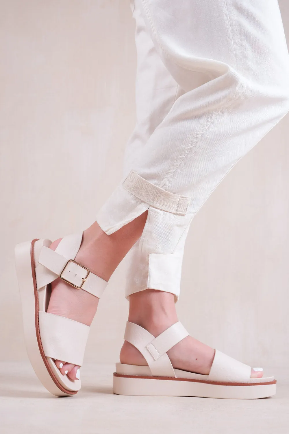 PHOENIX WIDE FIT CLASSIC FLAT SANDALS WITH STRAP AND BUCKLE DETAIL IN CREAM FAUX LEATHER